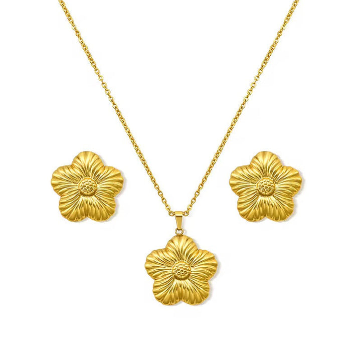 Gold floral necklace and earrings set on a white background. 18k Gold-Plated Jewellery Set – Necklace & Earrings”