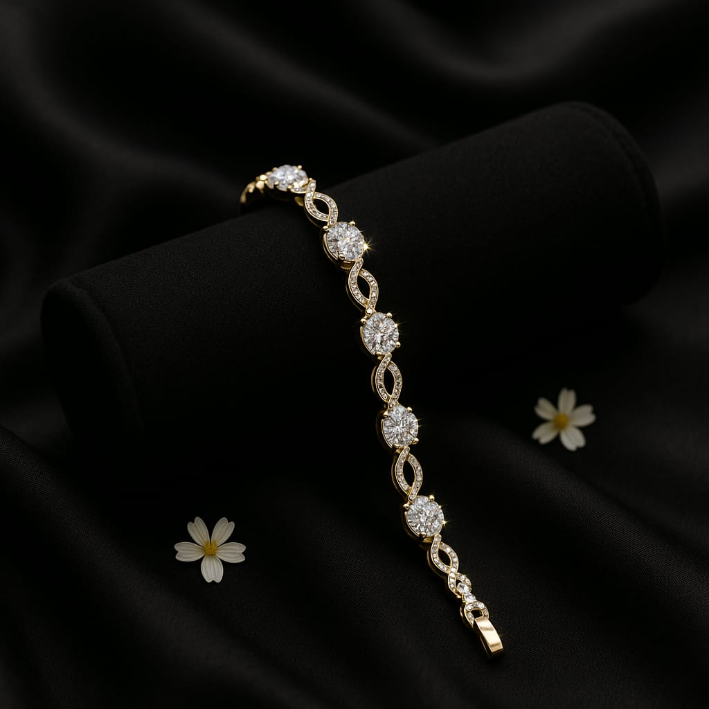 Gold bracelet with diamonds on a black fabric background