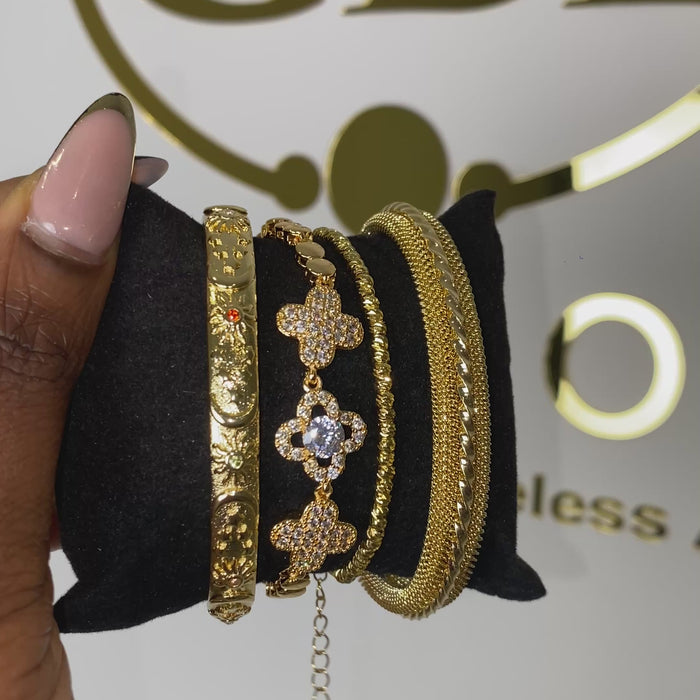 video showing 18k gold-plated bracelets and bangles