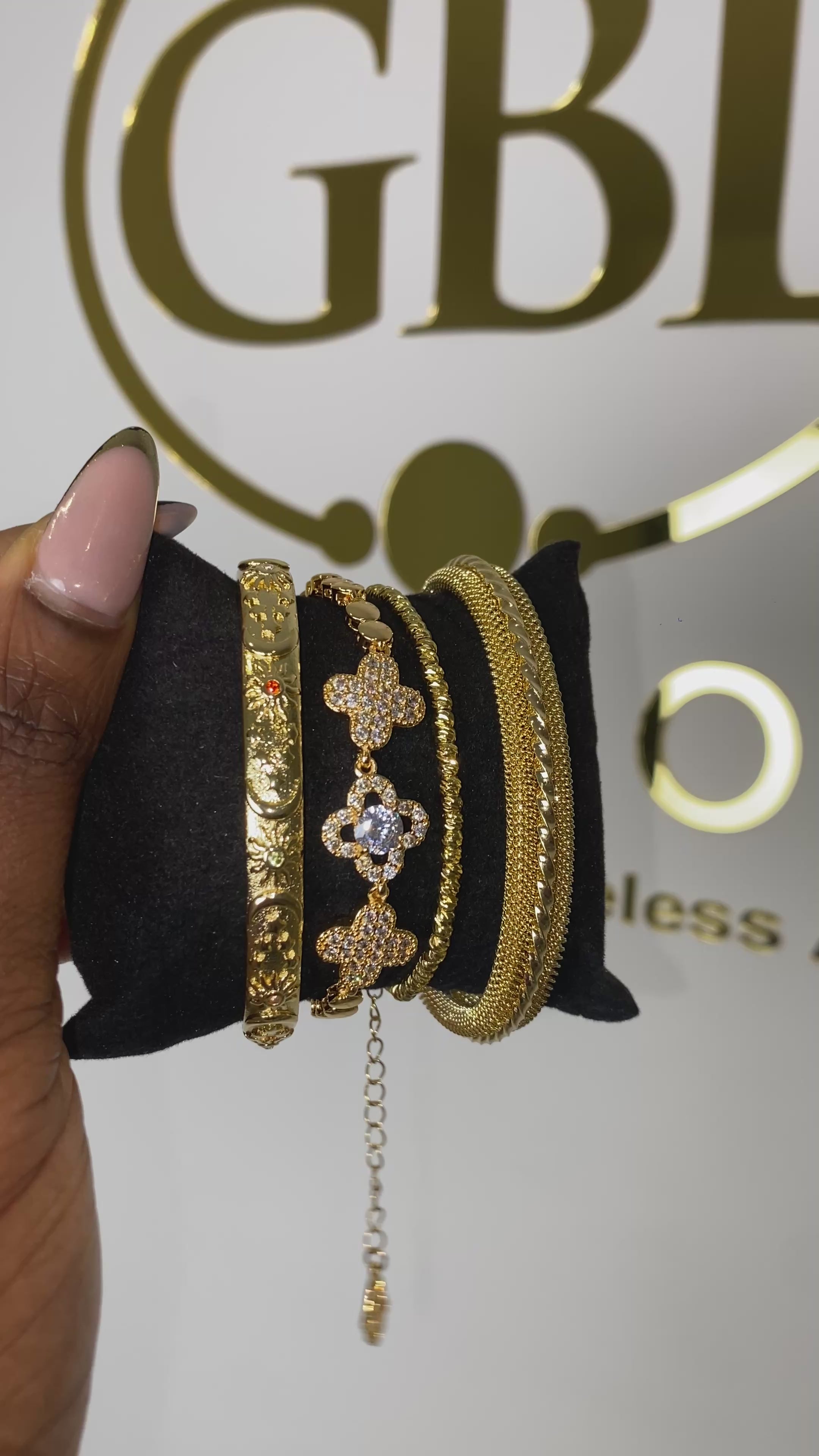video showing 18k gold-plated bracelets and bangles
